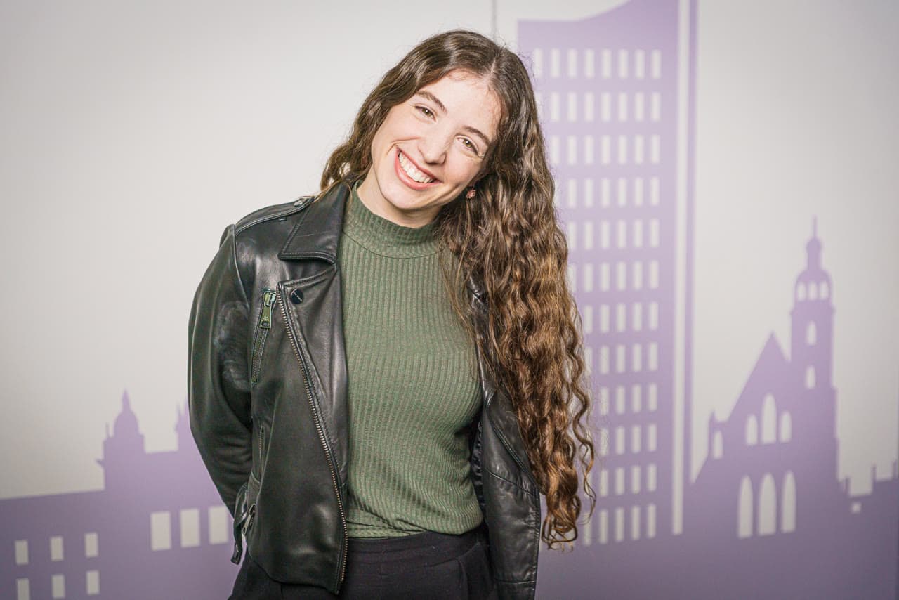 Elia Garcia Canabate smiling in a leather jacket